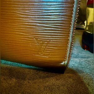 Louis Vuitton Zippy Wallet in Brown Epi-Leather